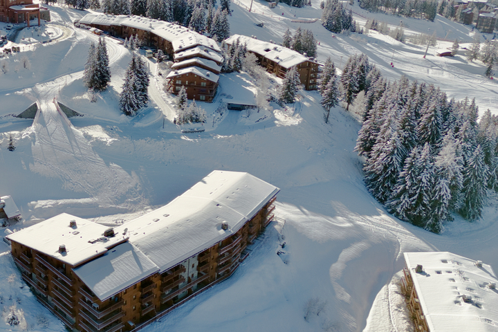 Our apartment building, surrounded by trees and easy access to the pistes