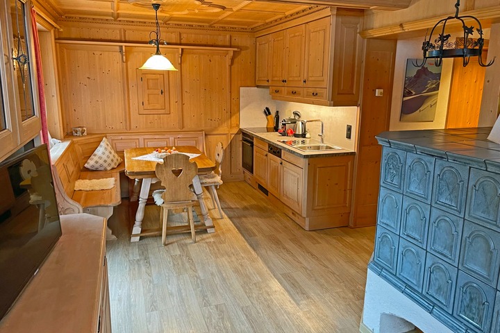 Warm wood and cosy tiled oven