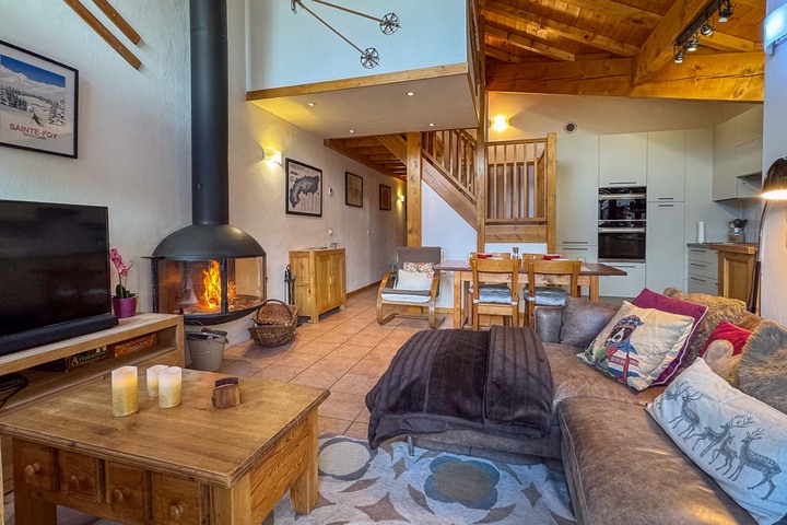 Open plan living area with log fire
